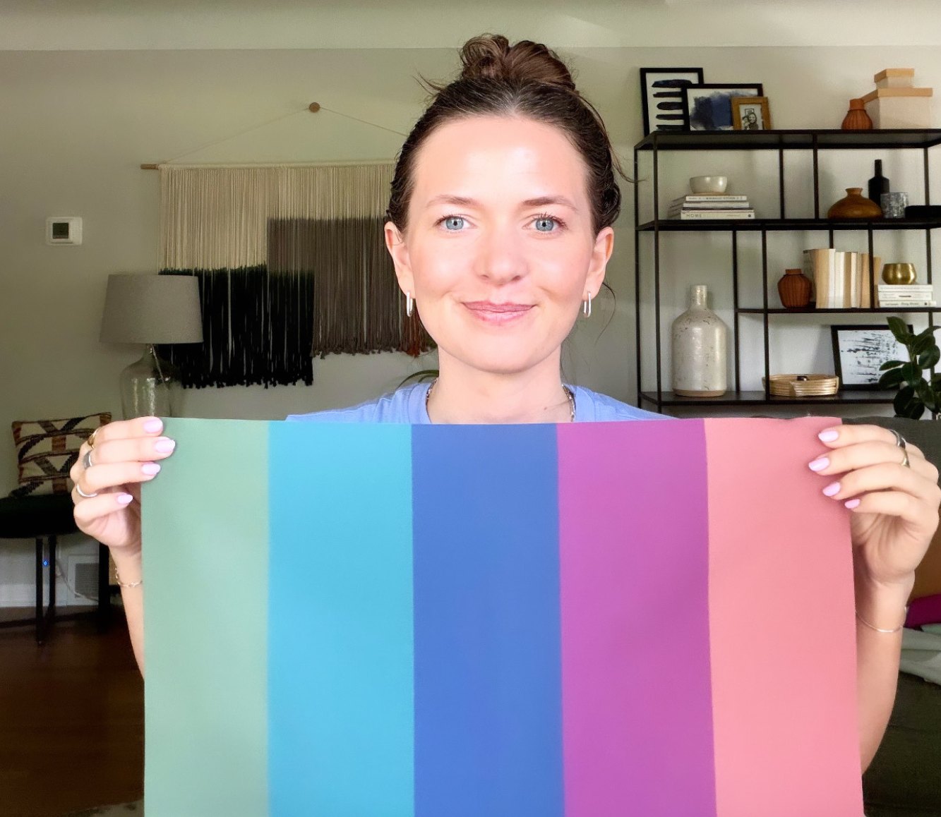 Nicole holding up a Soft Summer palette drape