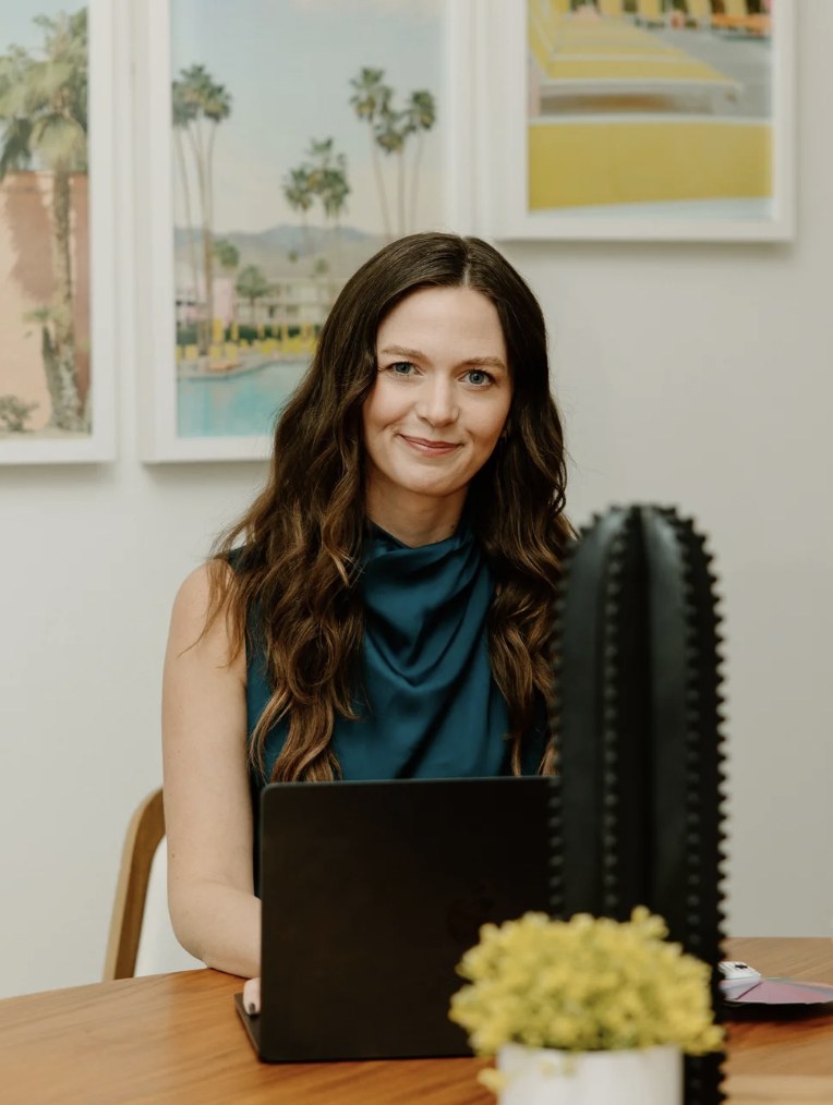 Nicole at her desk, completing a virtual color analysis by hand