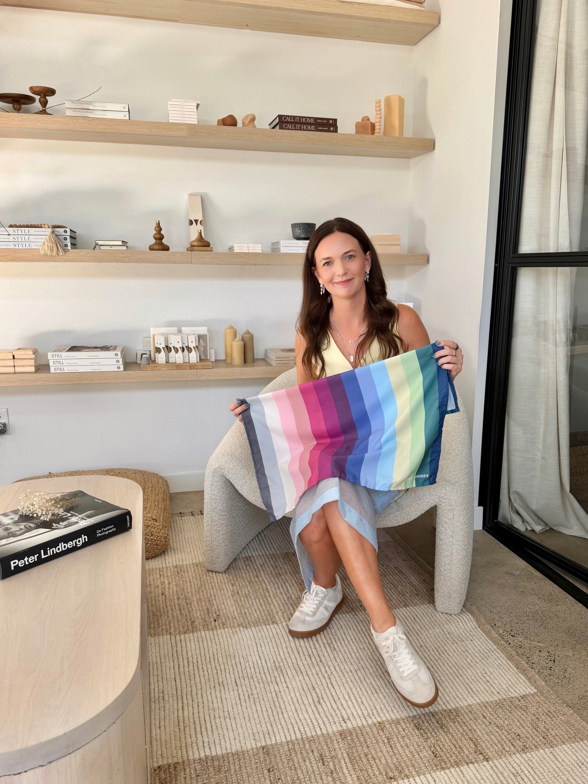 Nicole holding a seasonal drape in The Stylery's St. Louis Park studio