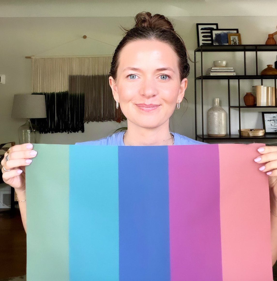 Nicole holding up a Soft Summer palette drape